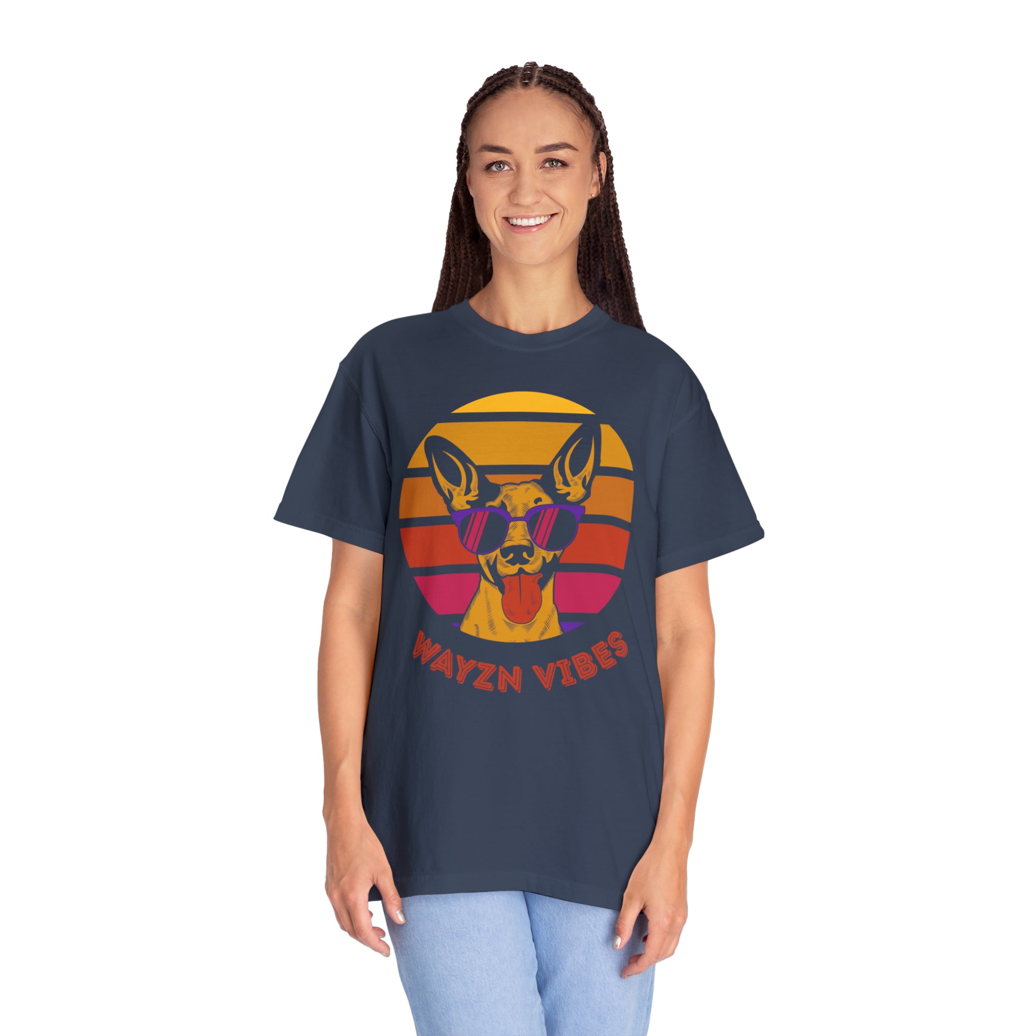 A person wearing a Wayzn Vibes unisex dyed t-shirt with a dog design.